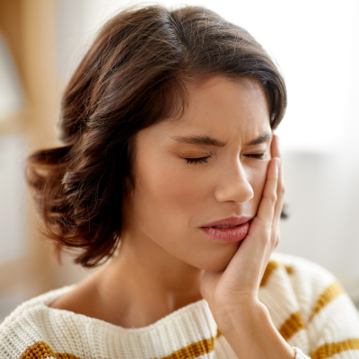 Woman with tooth pain